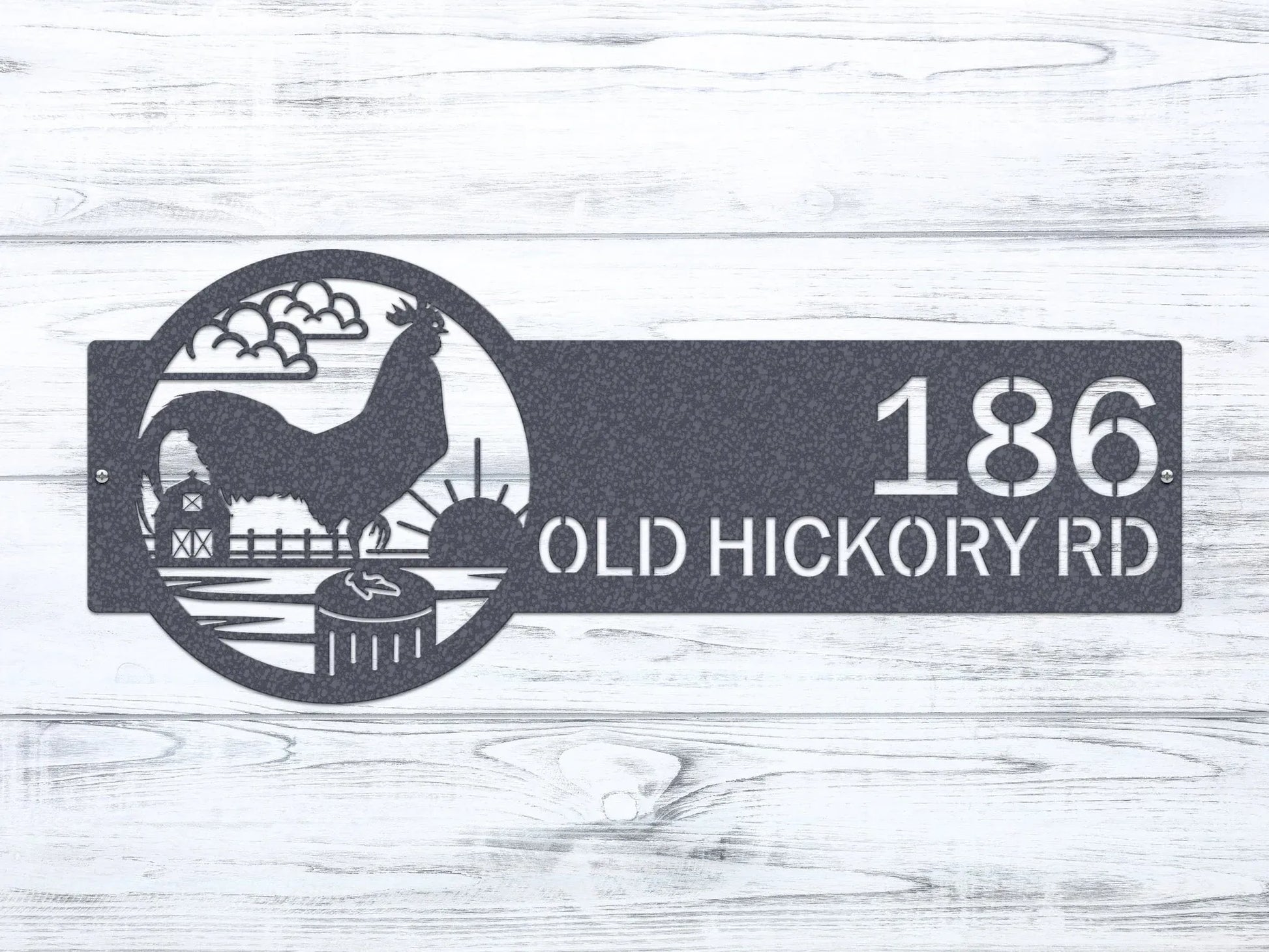 Black chrome Rooster Farm Address Sign with rooster, clouds, barn, and sun on right, and house number '186 Old Hickory Rd' on left.