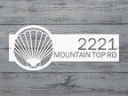 seashell metal address sign on white wood, personalized house numbers, coastal front door décor, outdoor nautical plaque.