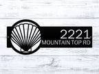 Seashell-themed house number sign on white wood background, personalized address plaque, outdoor coastal décor, front door metal sign, nautical home accent