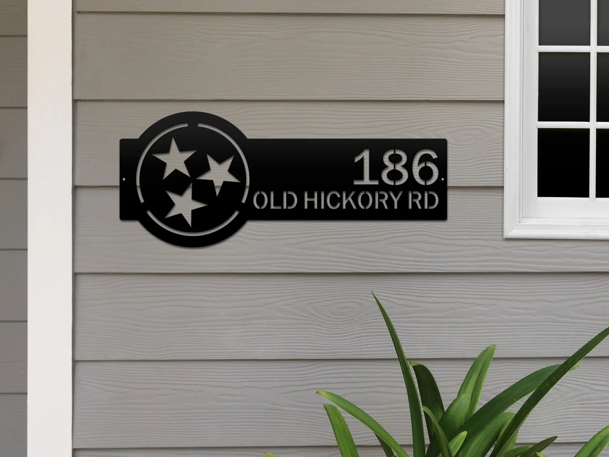 Black Tennessee Tristar Address Sign featuring a Tristar emblem on the right and house number '186 Old Hickory Rd' on the left, mounted on the wall.