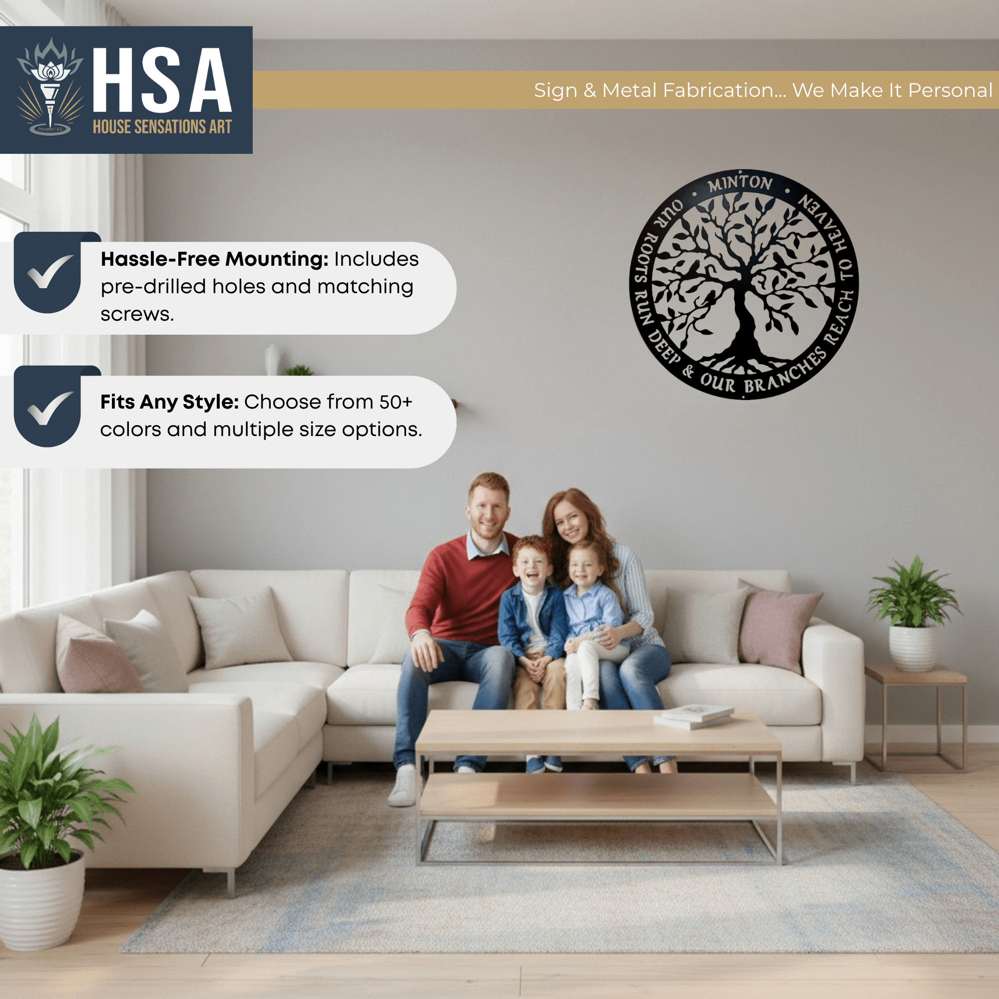 Family sitting on a couch in a living room with a wall-mounted metal art piece featuring a tree design, creating a warm and inviting home décor setting.
