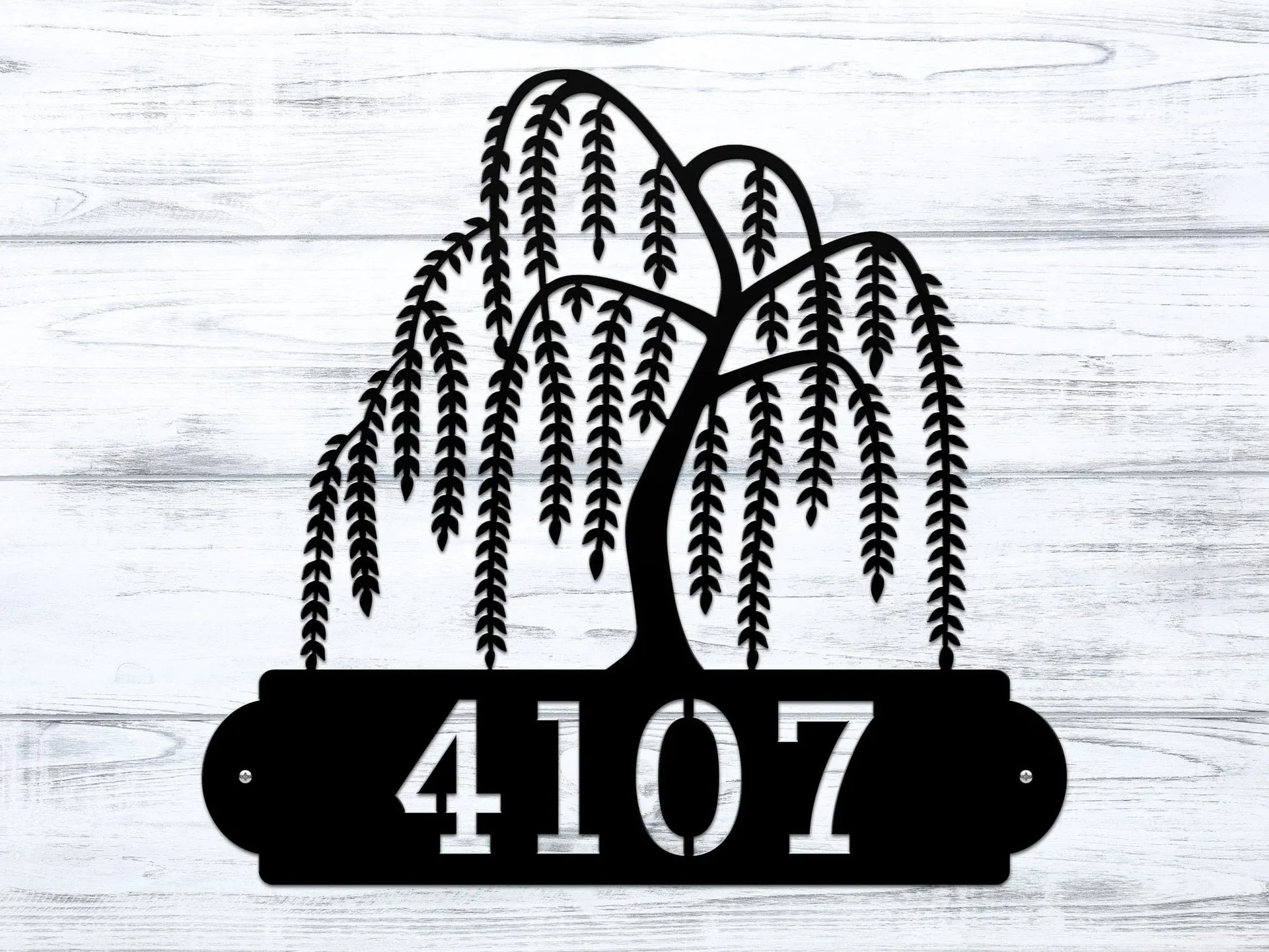 Close-up of black Weeping Willow Address Sign with a weeping willow tree design on top and house number '4107' below.