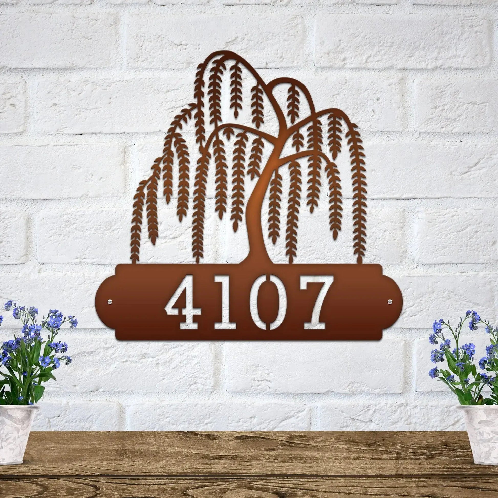 Close-up of bronze Weeping Willow Address Sign with a weeping willow tree design on top and house number '4107' below.