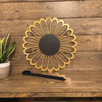 Sunflower metal wall art sample with hook, decorative display on wooden surface, plant accent, modern handcrafted floral decor, home styling design art