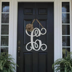 custom-front-door-wreaths-with-initial-for-elegant-entryways-white-black-close-door-House-Sensations-Art.jpg