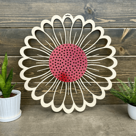 Metal flower wreath wall art with pink center and white petals on wood backdrop, rustic farmhouse décor, custom powder coated metal sign, outdoor home accent design