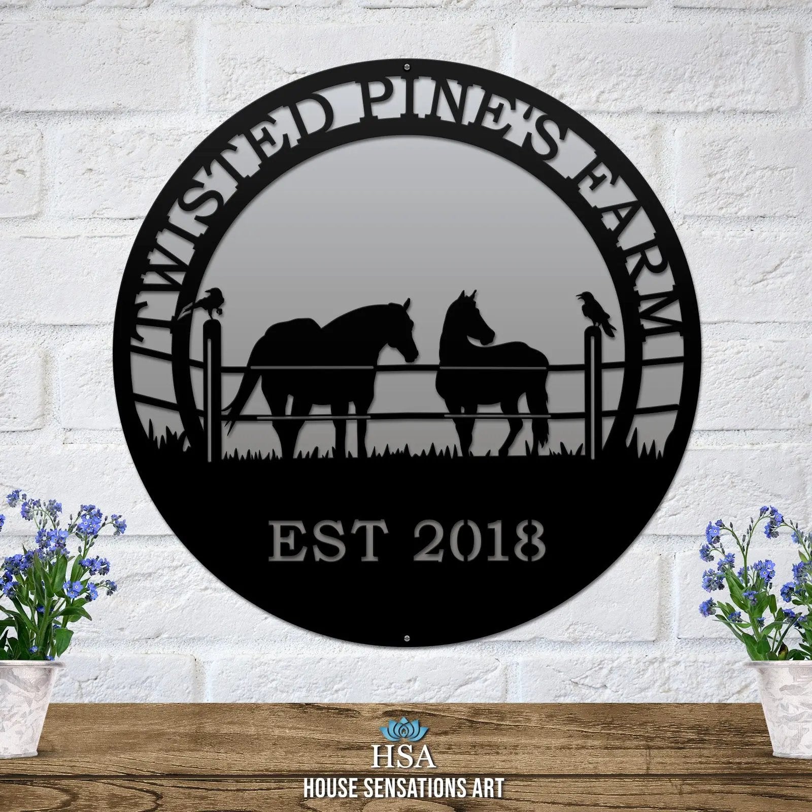  A black custom laser cut metal ranch sign showing horses in pasture, with “TWISTED PINE’S FARM EST 2018” text.