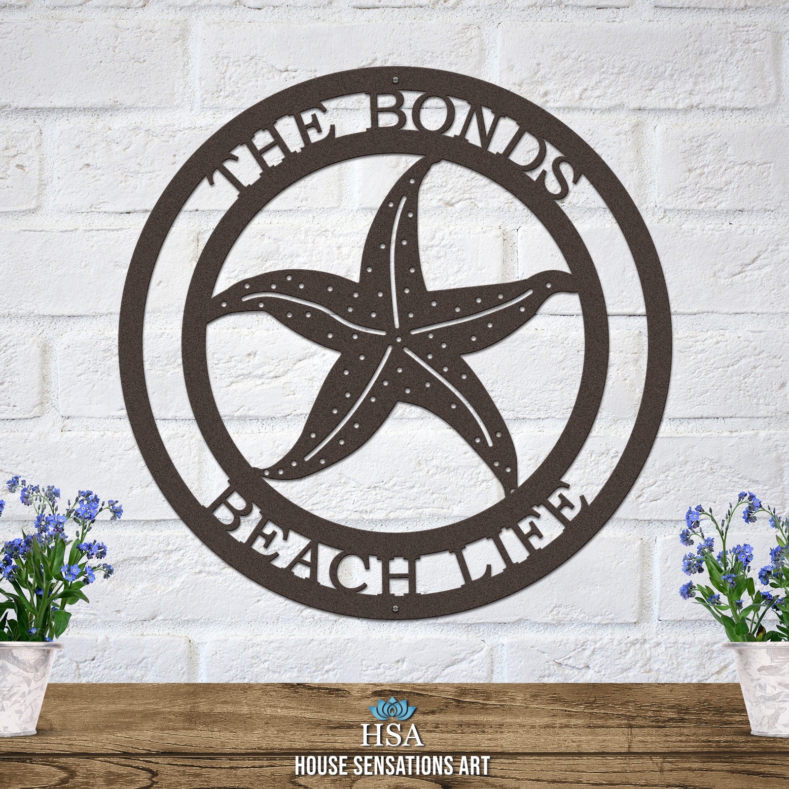 Oil-rubbed bronze custom laser cut metal beach sign with starfish and “THE BONDS BEACH LIFE” text, coastal outdoor decor.
