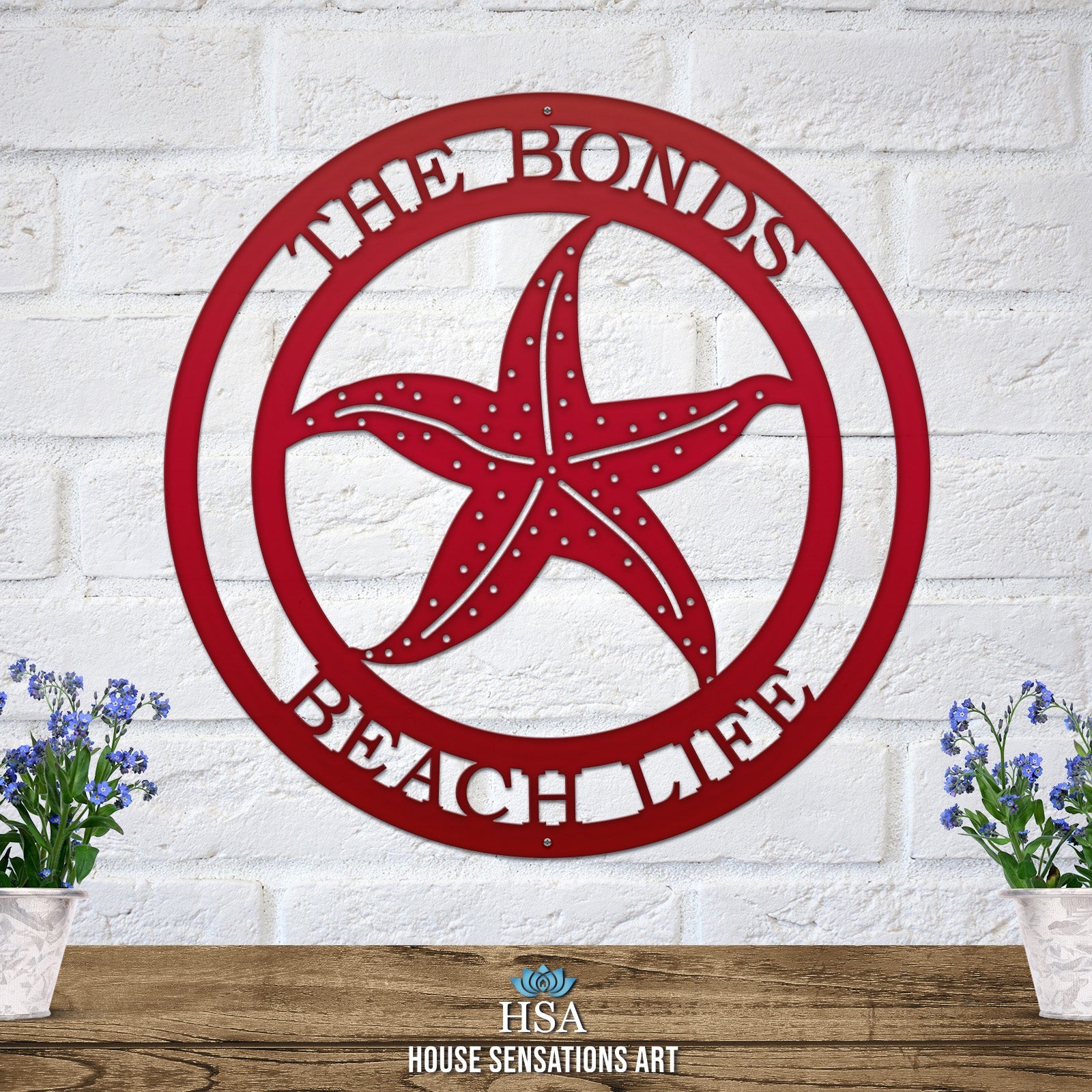 Deep red custom laser cut metal beach sign with starfish and “THE BONDS BEACH LIFE” text, coastal outdoor decor.
