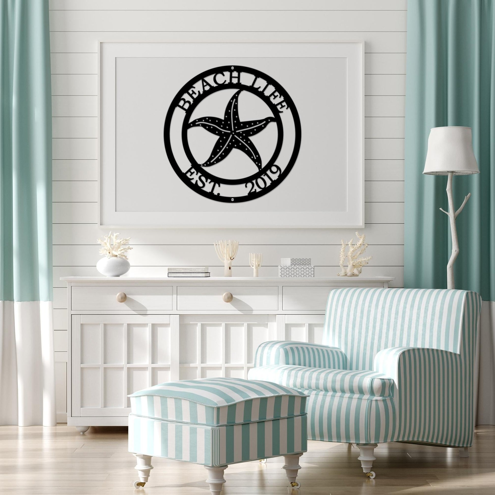 Black custom laser cut metal beach sign with starfish and “BEACH LIFE EST 2019” text, cozy indoor beach-themed decor.